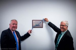 Mike Penning MP & Martin Partington with a plaque to commemorate the opening of TDS' office